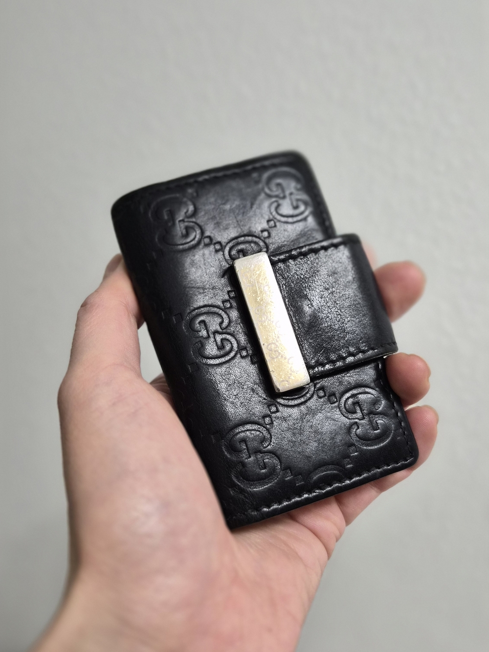 Gucci Black Embossed Leather Key Holder with Gold-Tone Clip